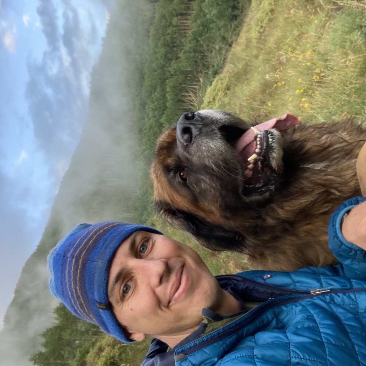 Neve Savelli hiking in Telluride, Colorado, with his dog