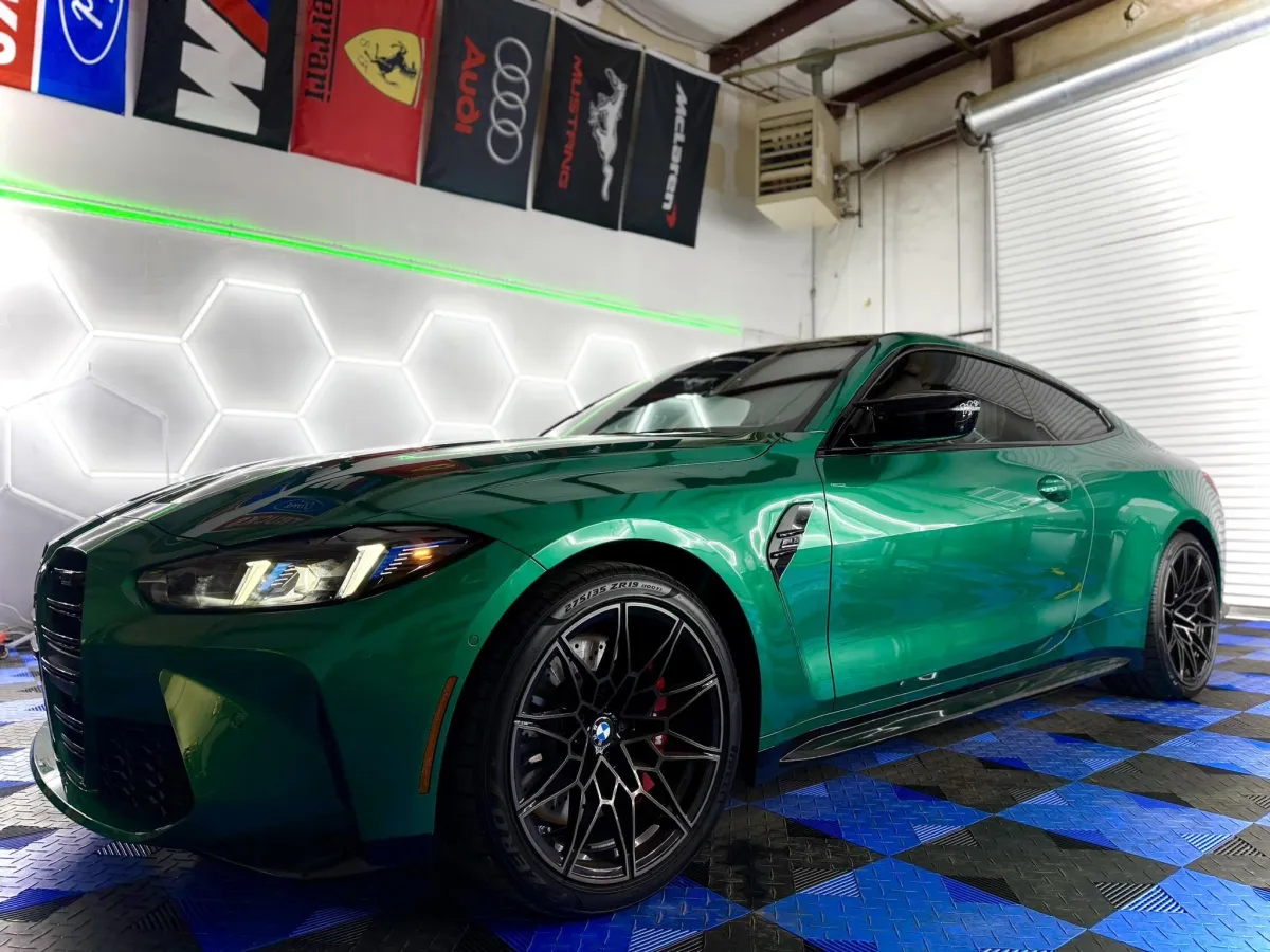 Green BMW with window tint at Venom Tint Acworth