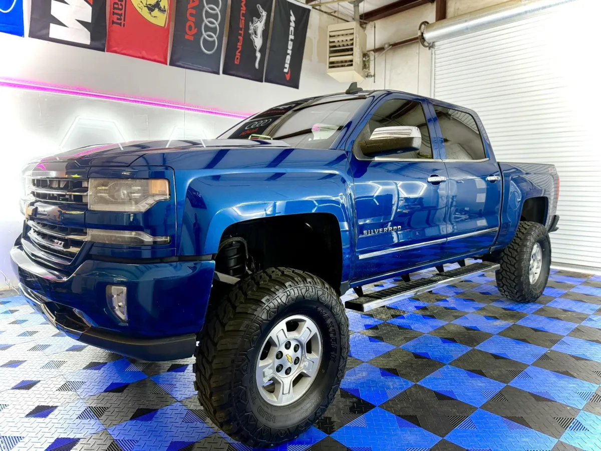 Blue Chevrolet Silverado with window tint at Venom Tint Acworth