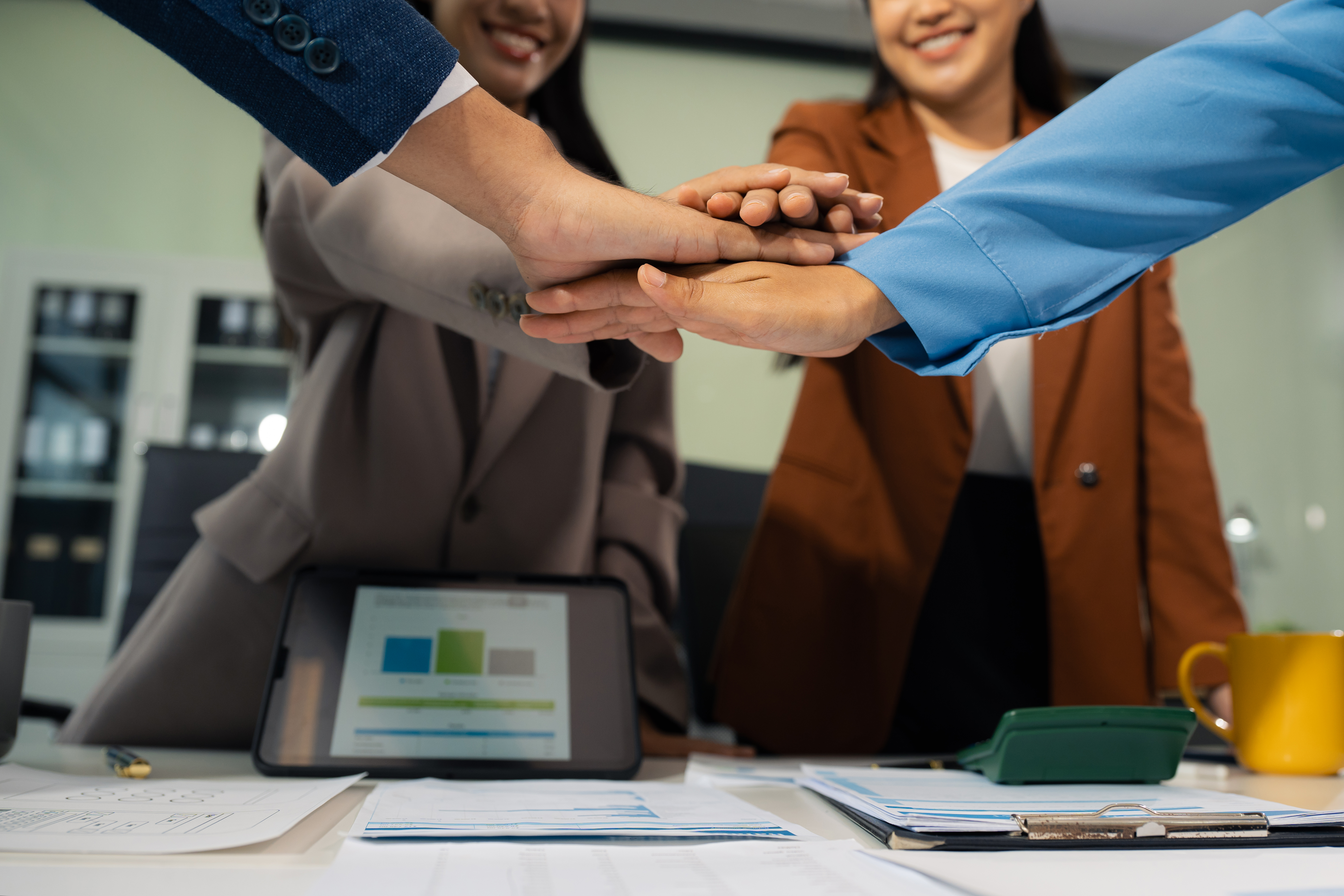 iSource Asia founding team collaborating in the Mandaluyong office