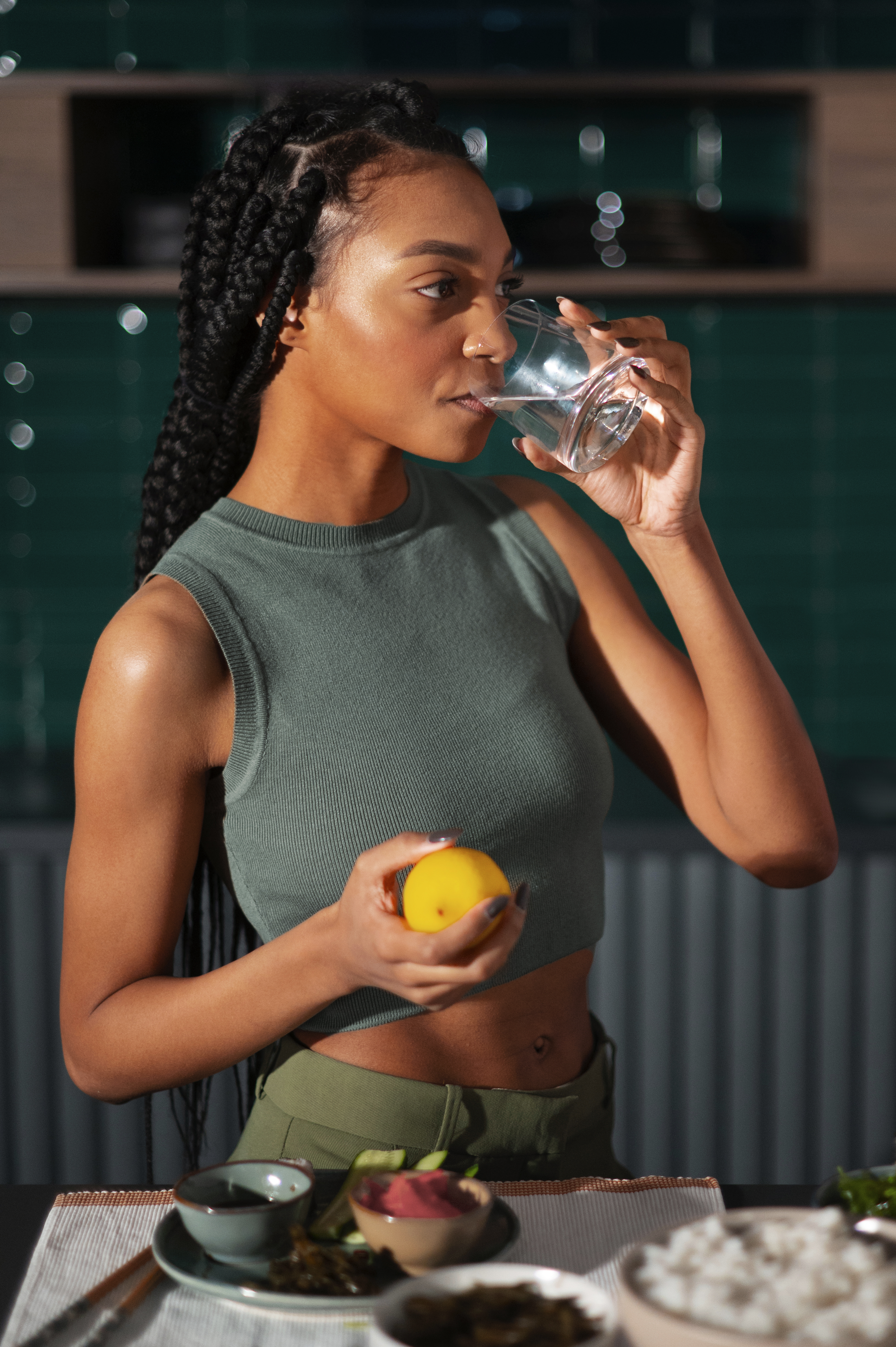 person about to touch the calm water