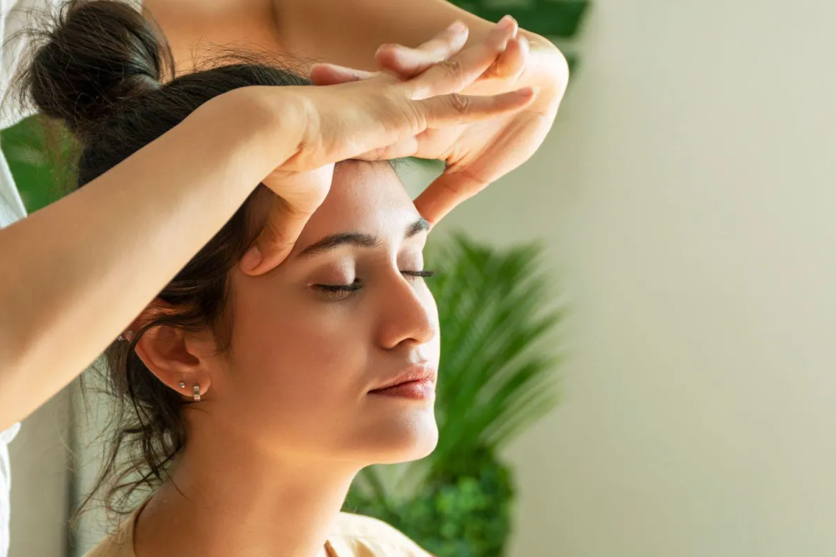 Hero image — Indian Head Massage treatment in progress, or Lindsey teaching the technique