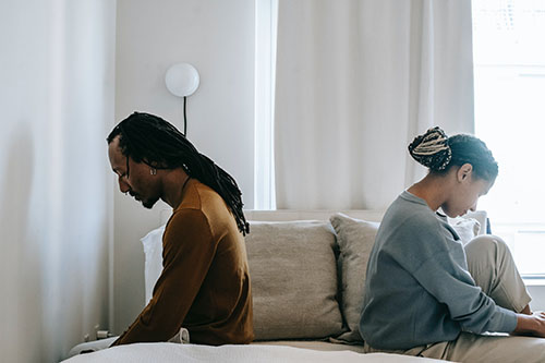 A couple that has become disconnected and disinterested in one another and need professional therapy to rekindle their relationship