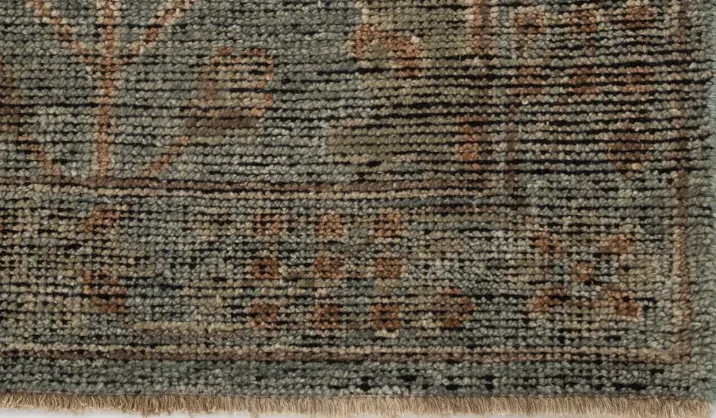 Up close of the colors and textures of a large woven rug, curated on The Collective Haus' blog based out of Boise, ID. 