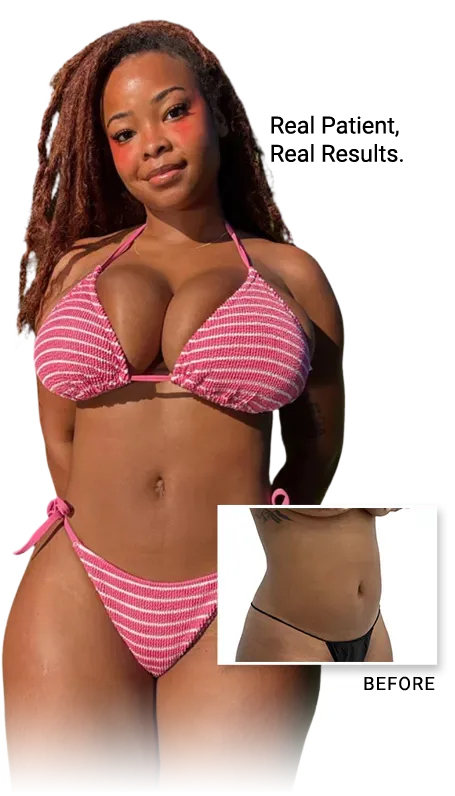 person holding clear glass bottle