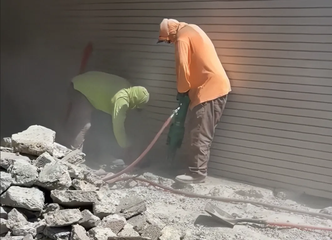 Concrete demolition crew hard at work