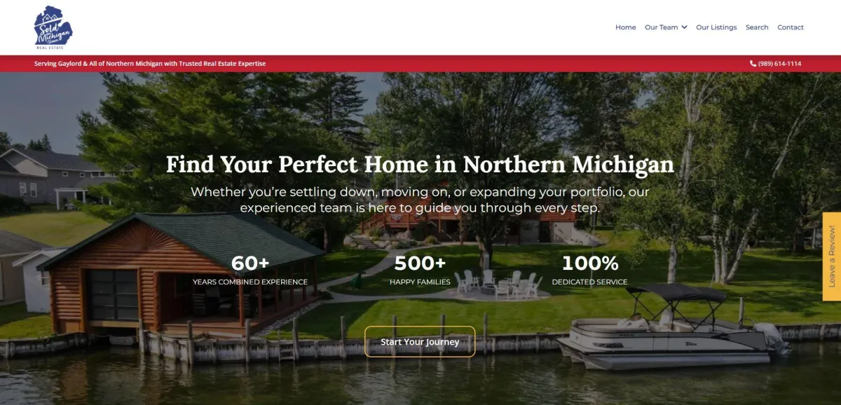 Log cabin by the water in Northern Michigan, showcasing a serene setting with lush greenery and a boat docked nearby, reflecting JCC Marketing Group's focus on real estate and community engagement.