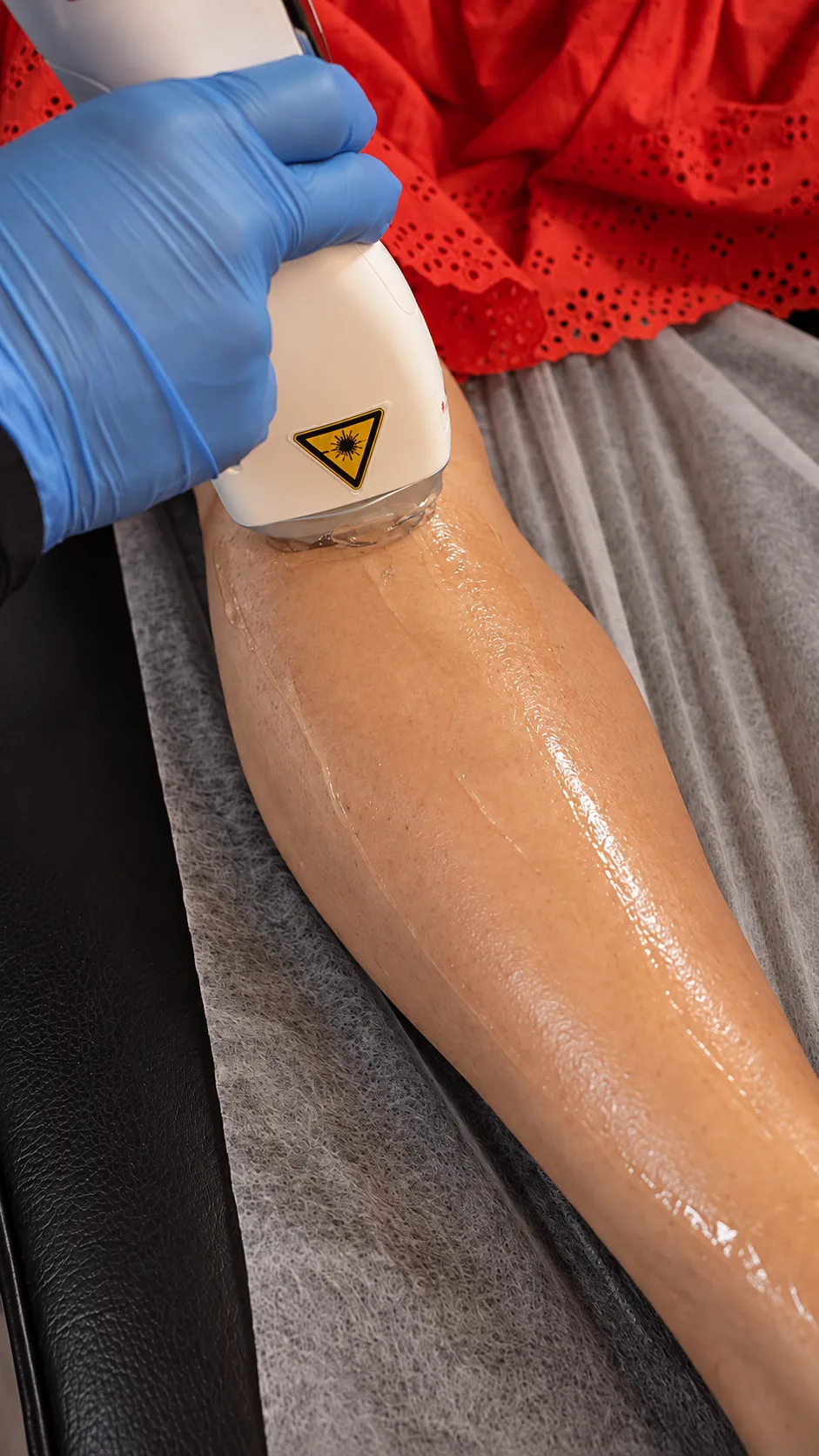 Aesthetic medical practitioner delivering precise, subtle facial injectables in a luxury clinical setting