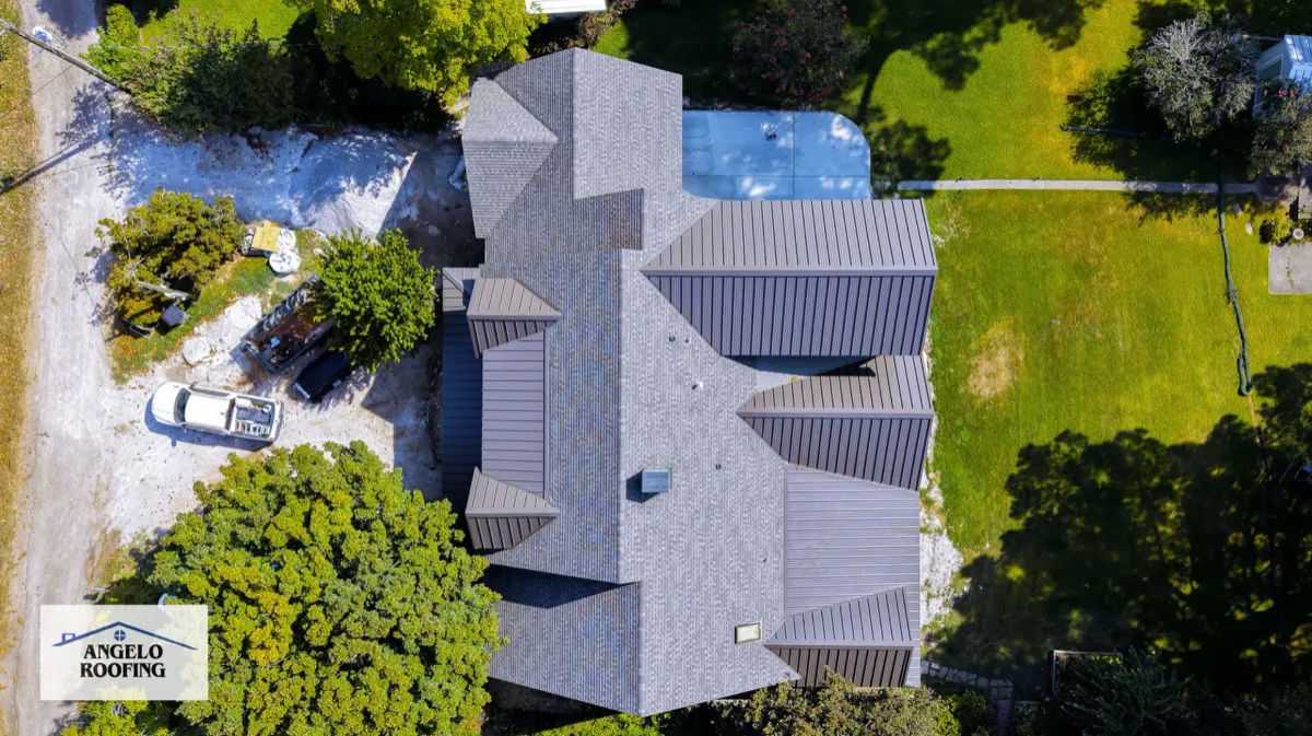 A home with a new black metal roofing equiped.