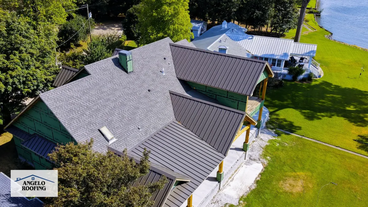 A residential home with two kinds of roofing material. Specifically metal roofing.