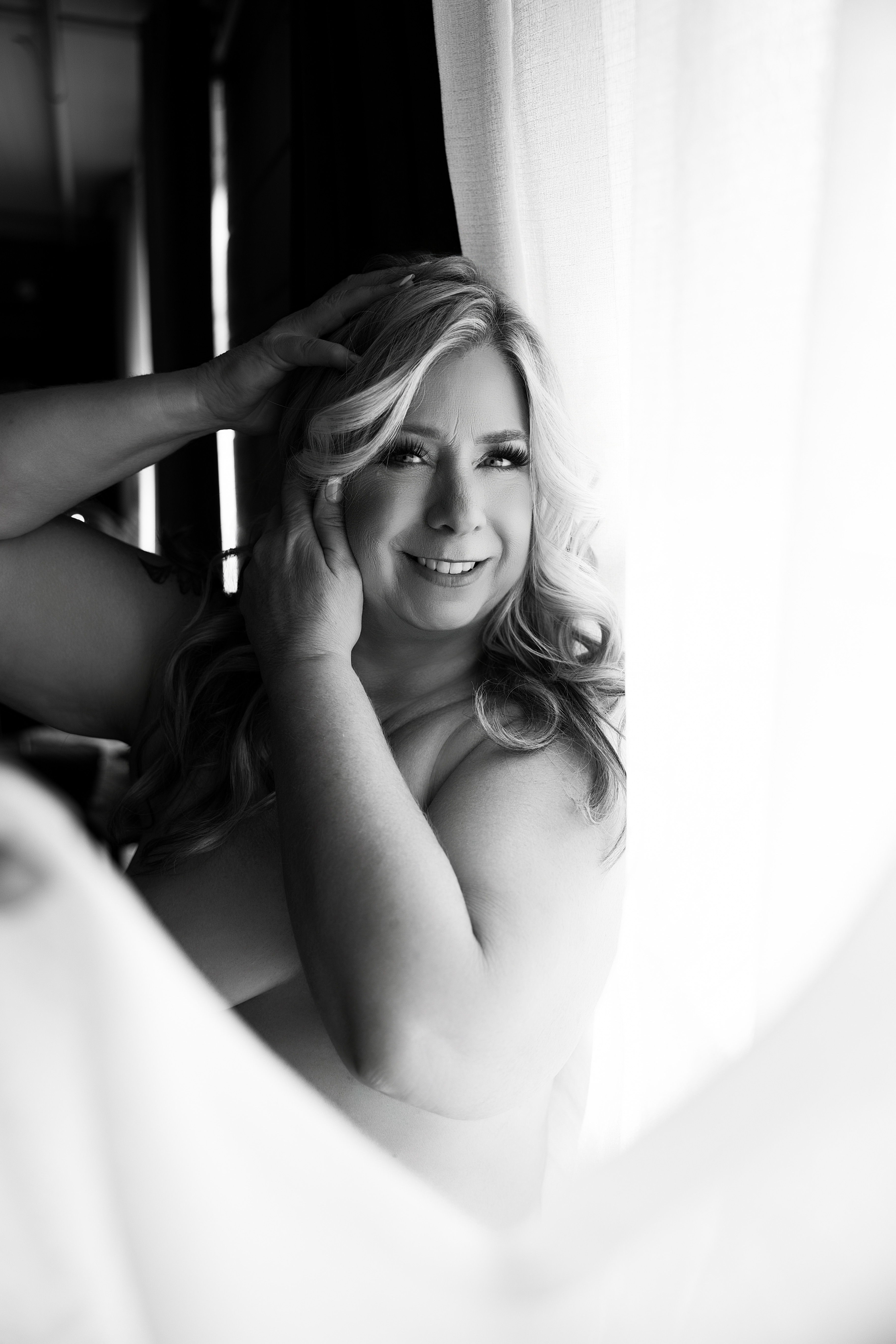 Bride in lace and veil for a bridal boudoir Spokane session