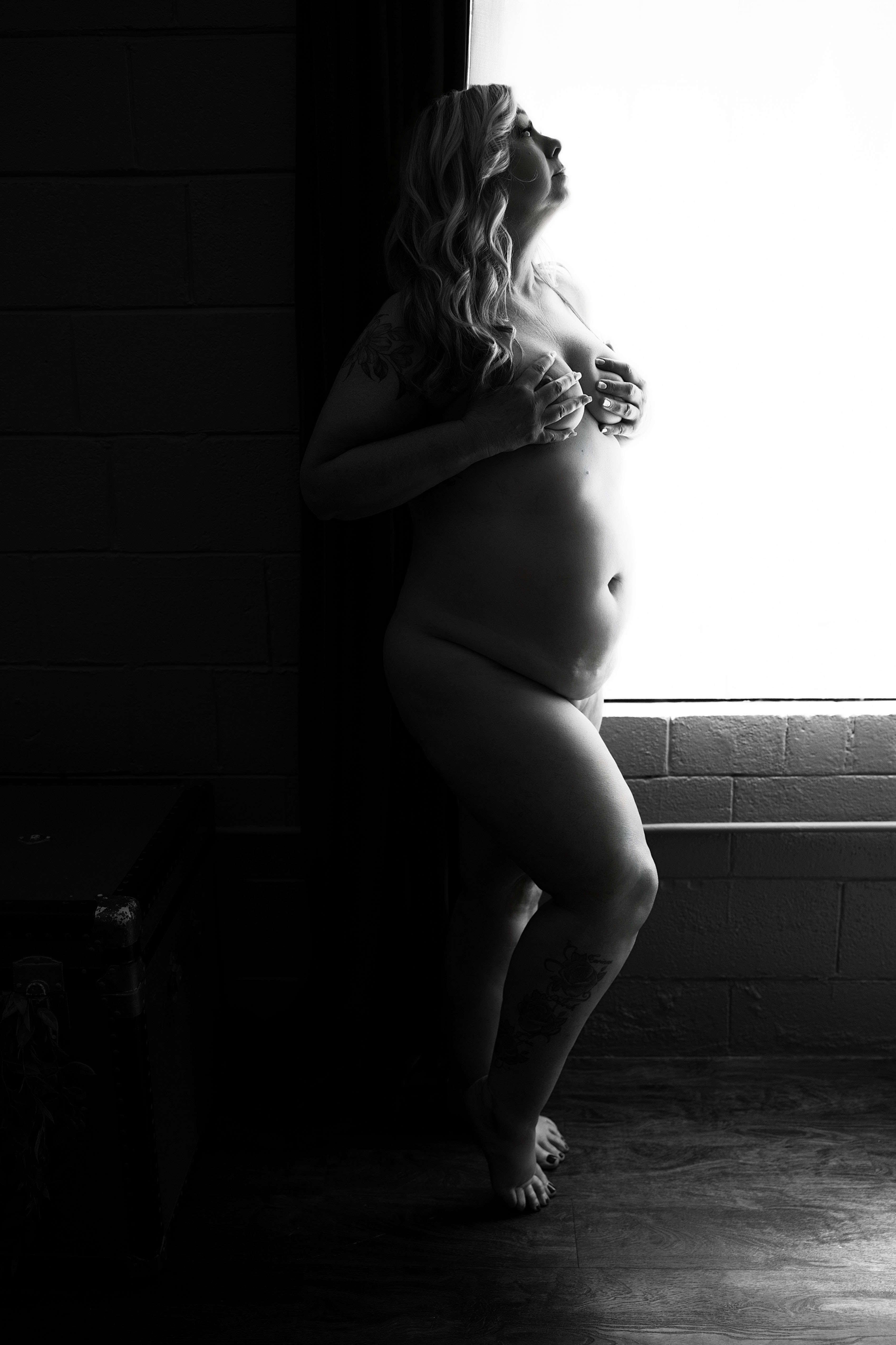  NudesArtistic silhouette of a woman in shadow, fine art boudoir Spokane