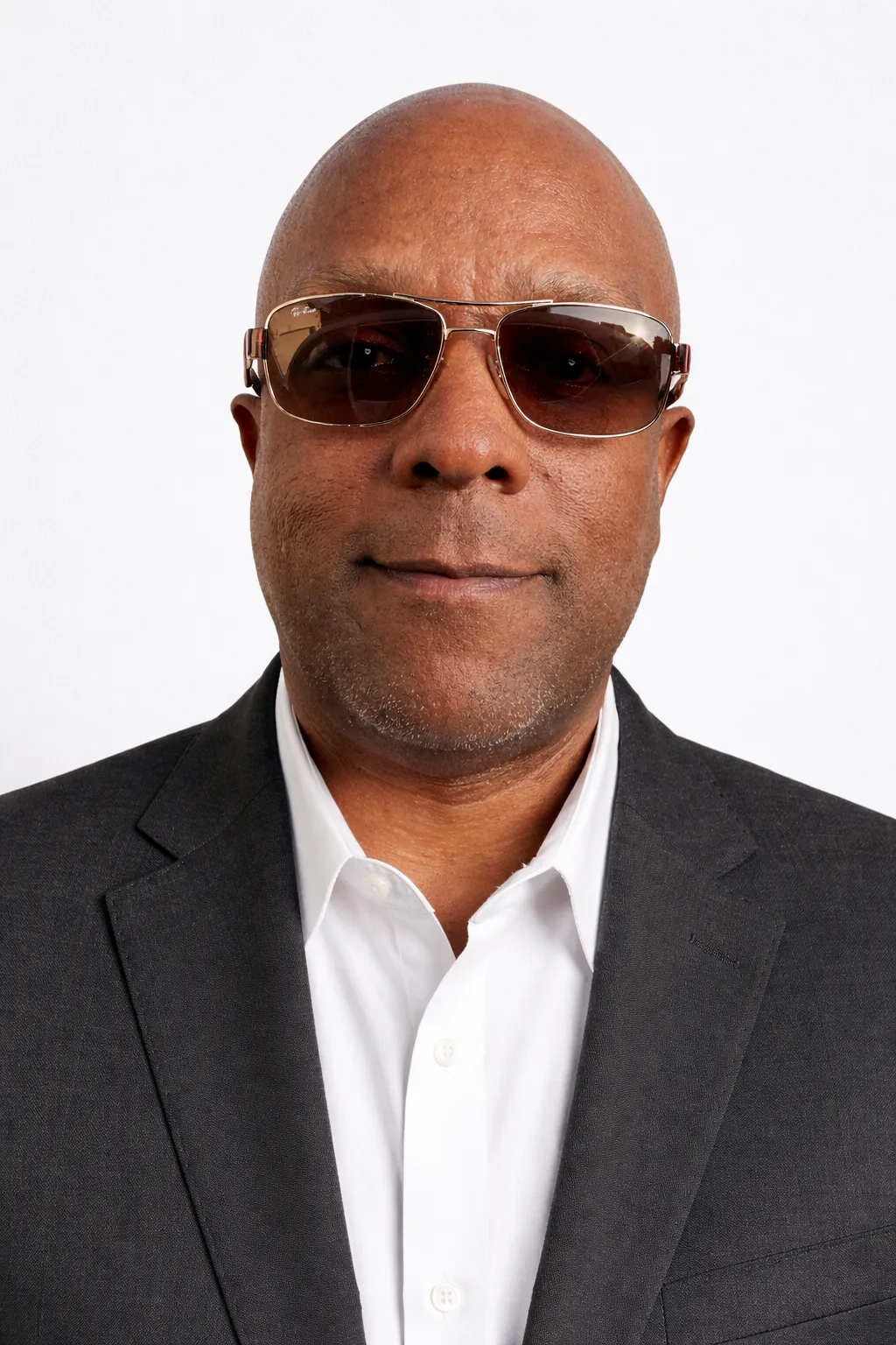 two women standing in front of a white board
