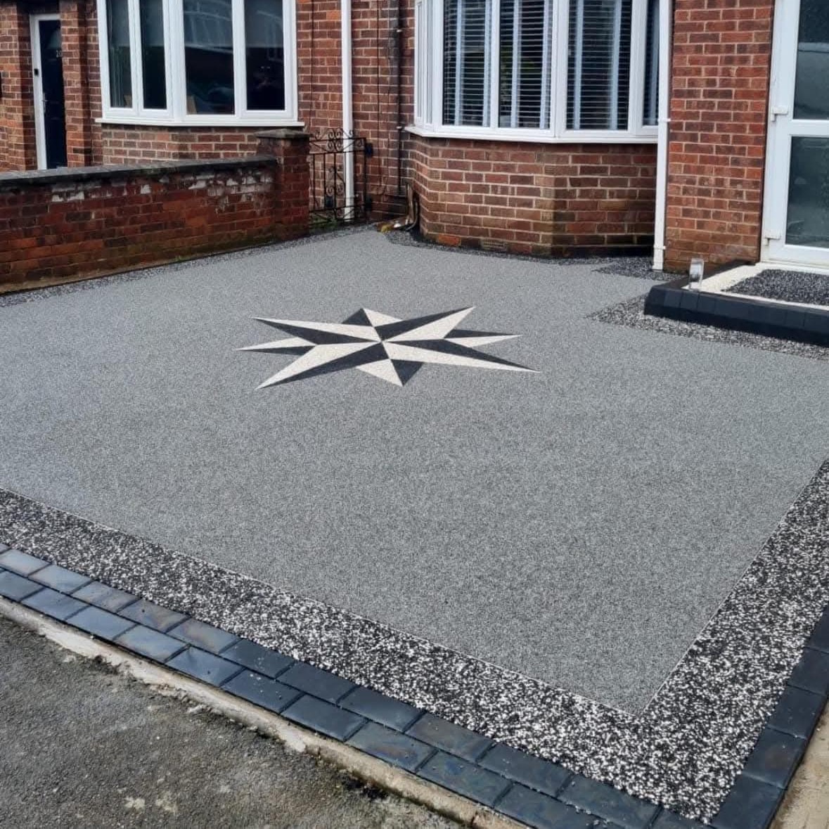 Resin bound driveway with decorative compass design installed by Equip2Save
