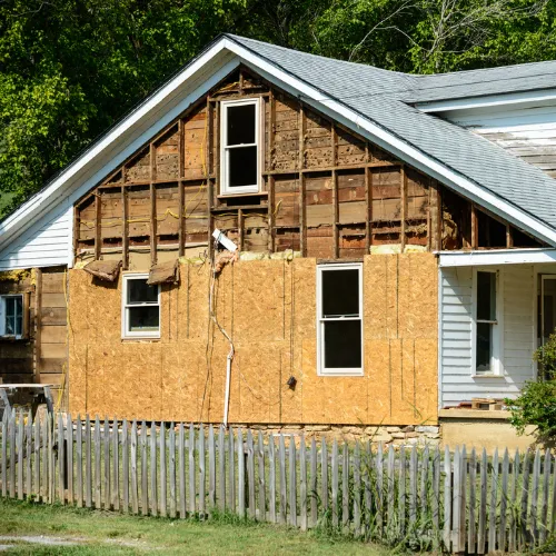 Graffiti damage on a building during a vandalism insurance claim inspection
