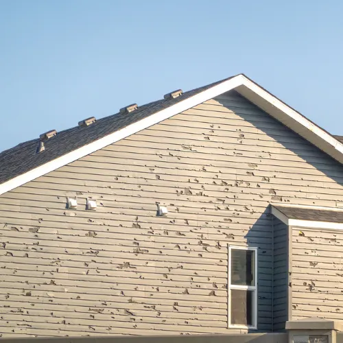 Public adjuster inspecting storm damage at a home in Downers Grove, IL