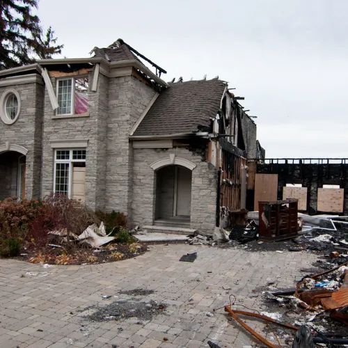 Detailed photos and notes used to support a fire and flood insurance claim