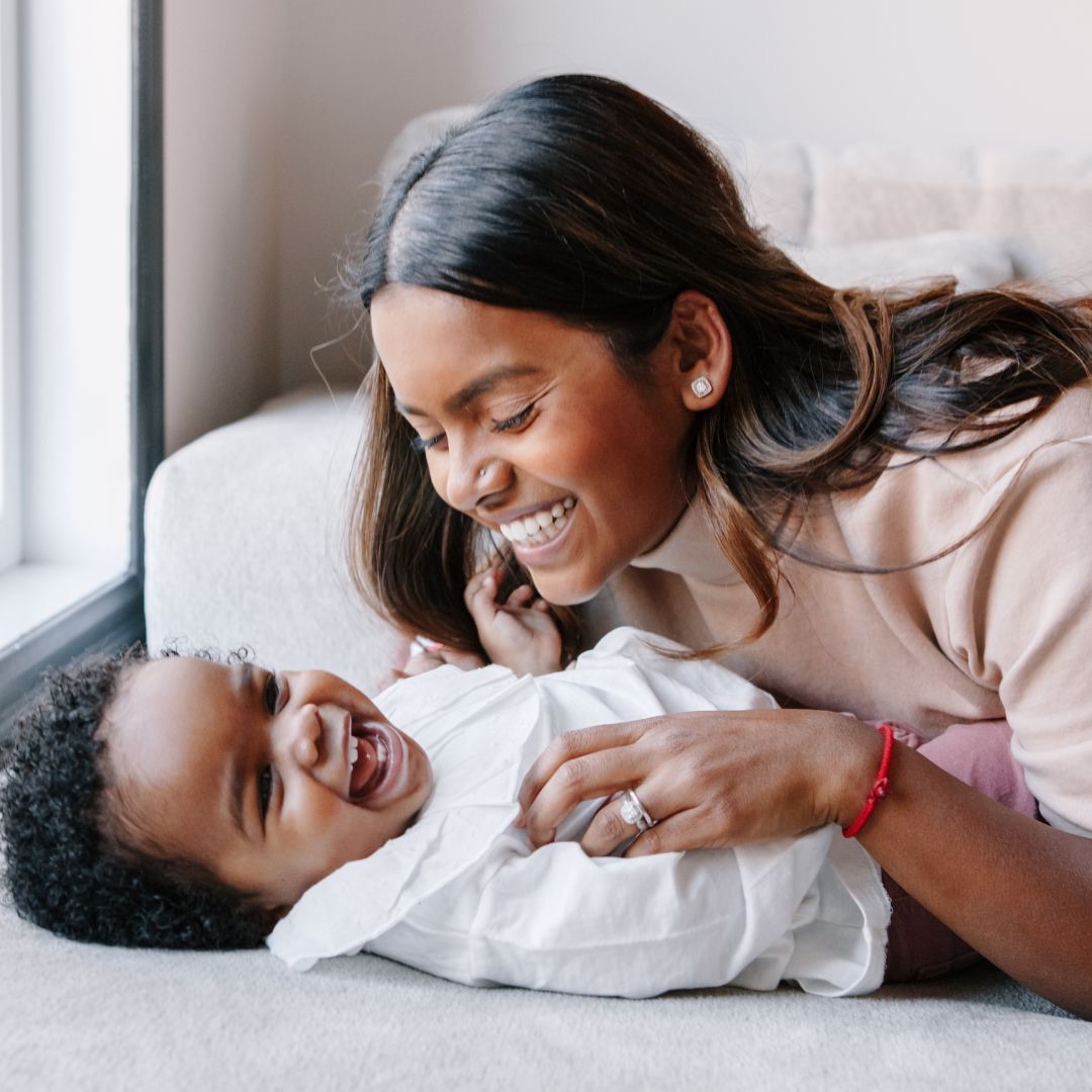 happy mother with toddler boy who receivings ongoing holistic care and support through The Well: Postpartum & Motherhood Renewal Retreat Located in St. Louis, MO