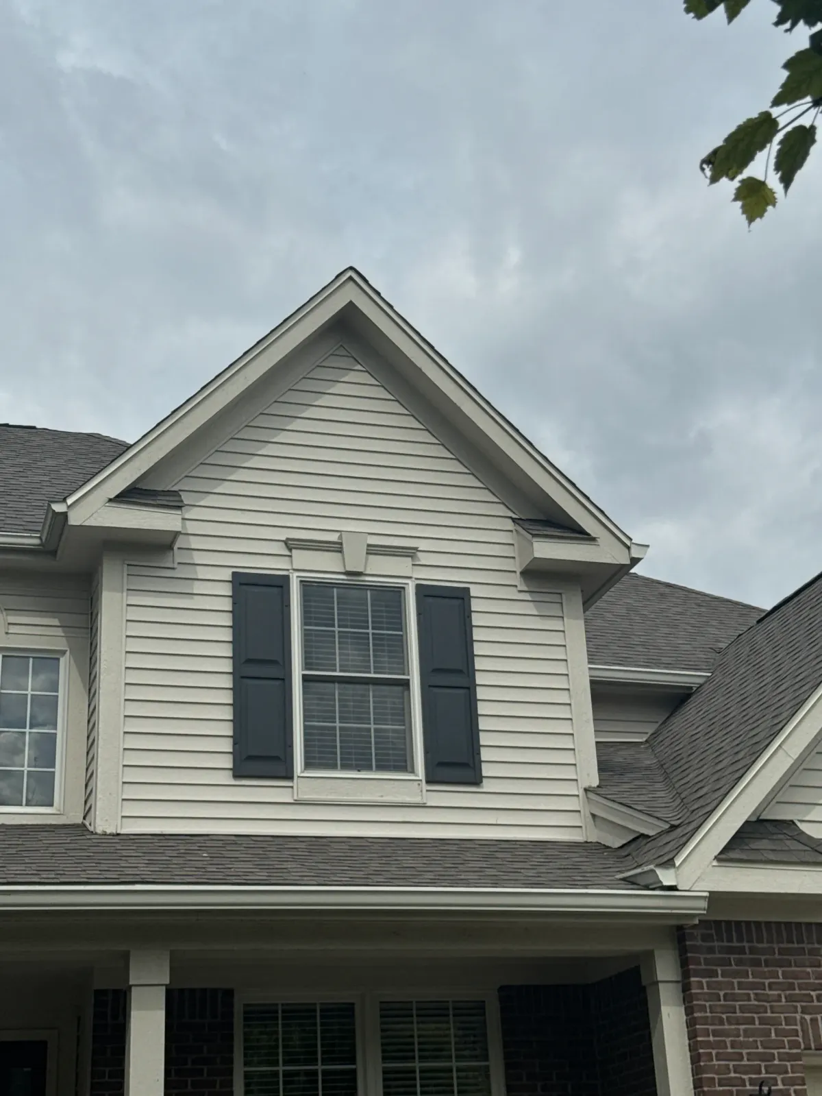 Happy homeowner with SummitShield project manager