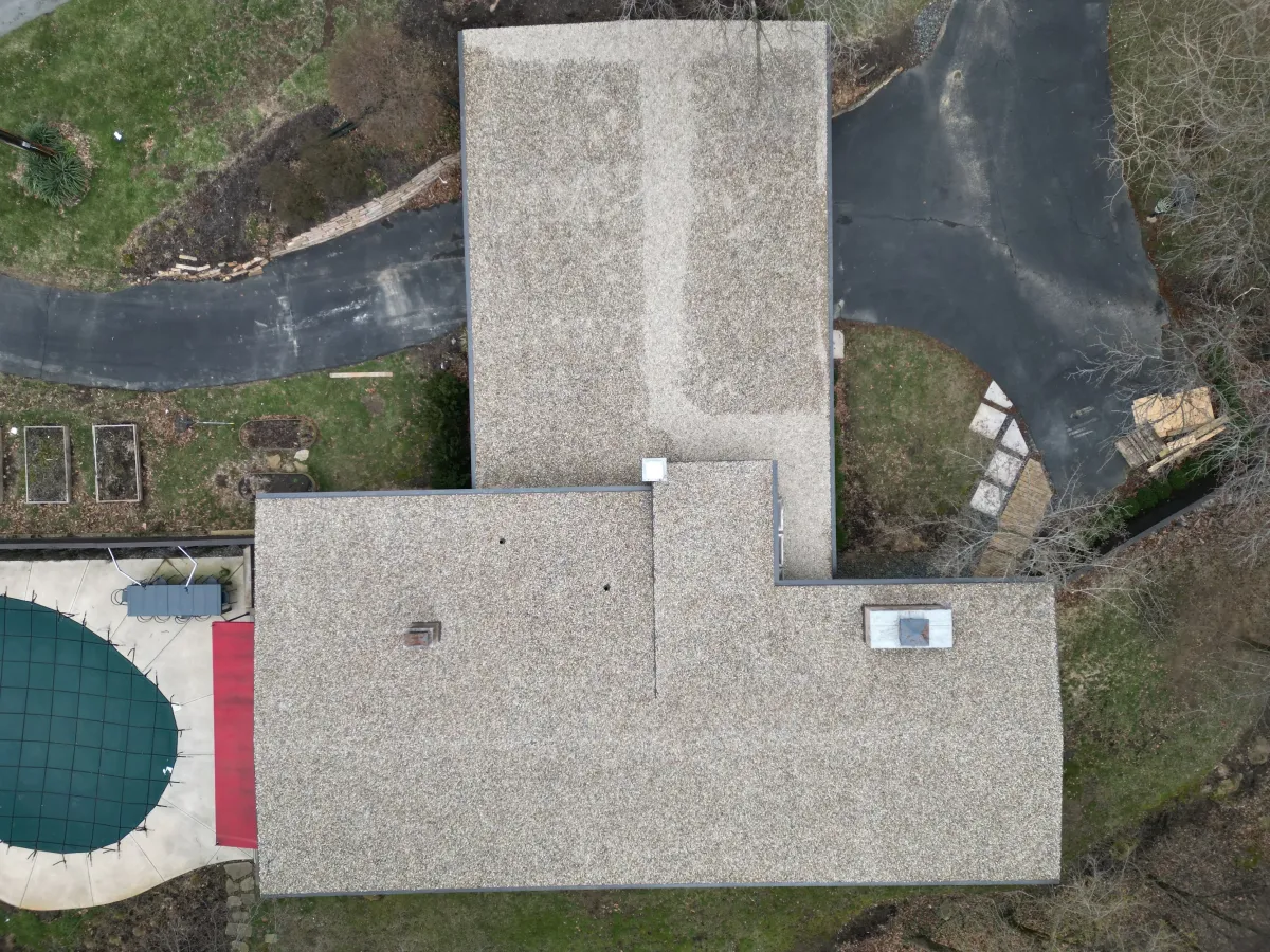 Happy homeowner with SummitShield project manager