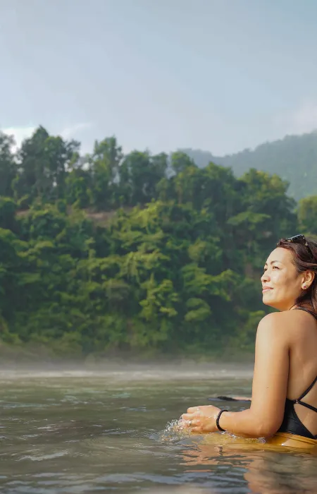 a body of water with a small island in the distance