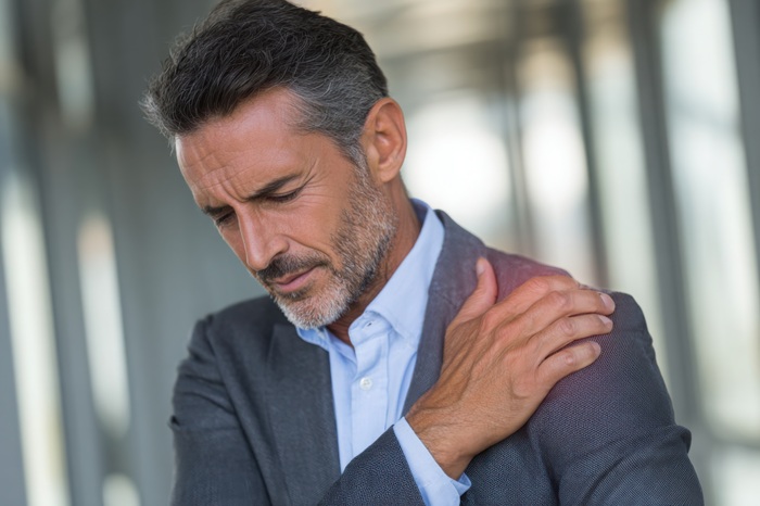 Business Man With Sever Shoulder Pain