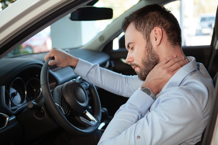 male-driver-having-neck-pain--after-car-accident