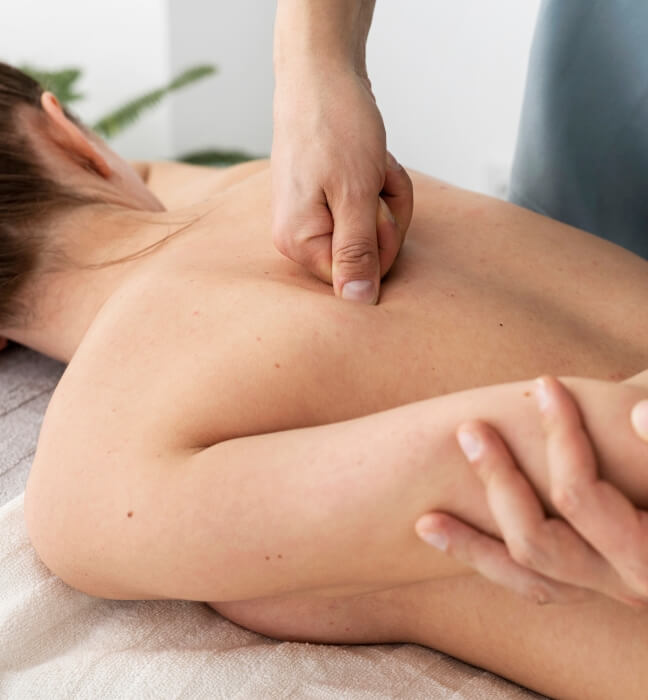 chiropractor doing chiropractic massage on women patient