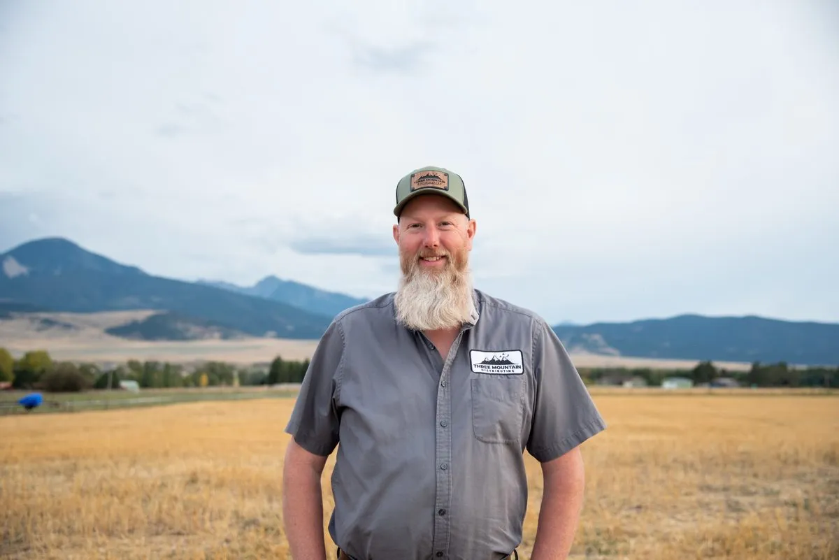 Chad standing by her delivery van in Livingston, MT