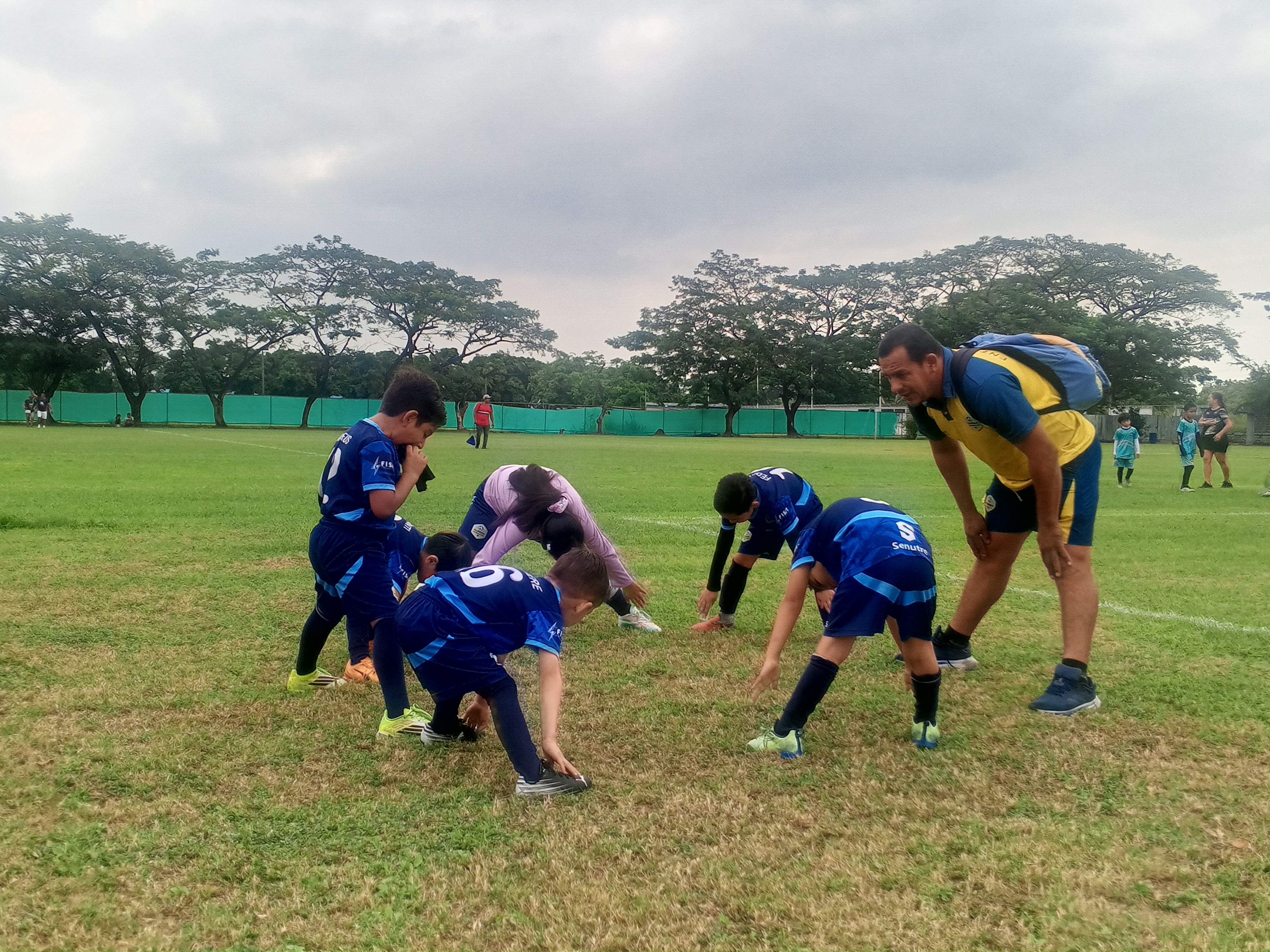 children playing soccer