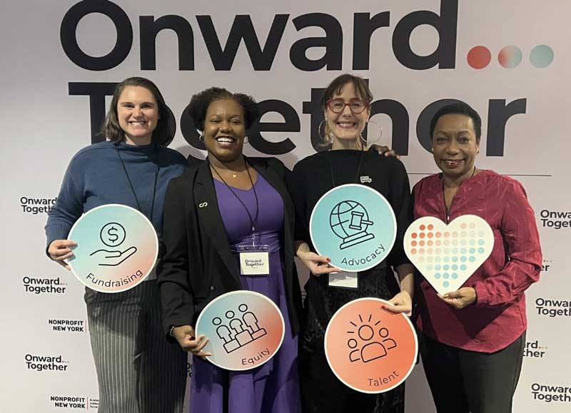 Coach Dora Mendez with nonprofit leaders at a Nonprofit New York event