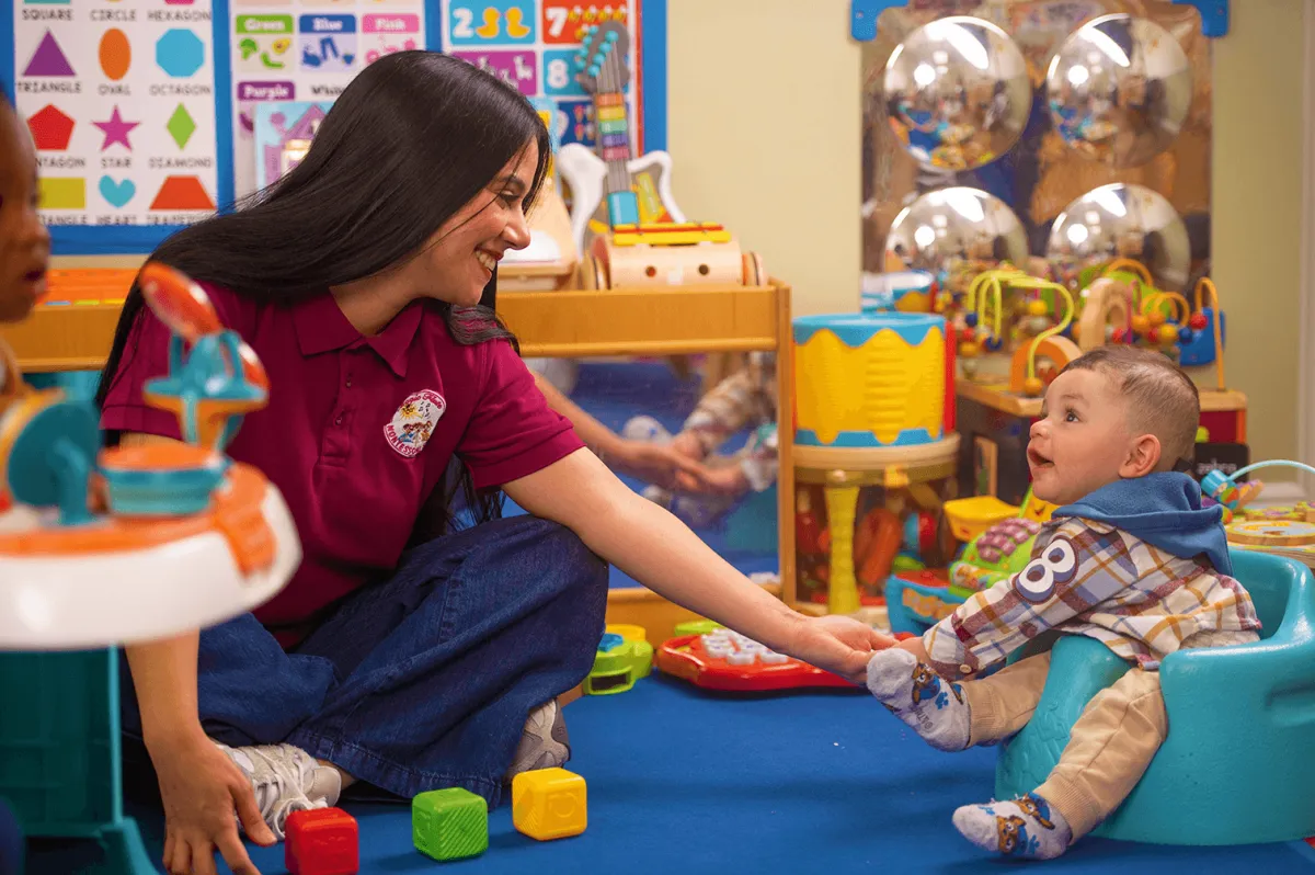 Teacher with young infant