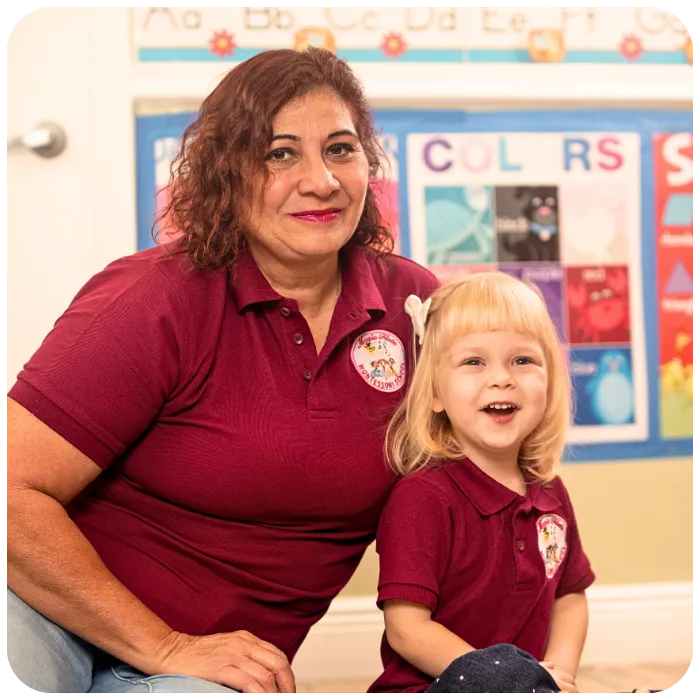Teacher and student sitting together
