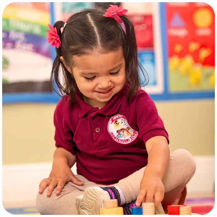 Child playing with wooden blocks