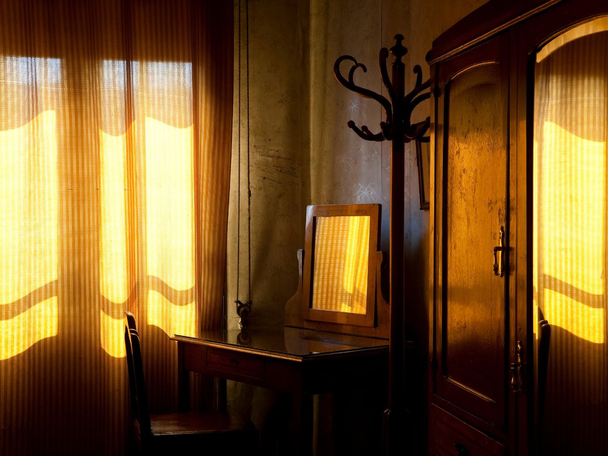 Golden light breaking into a dark room, the shift that is yours