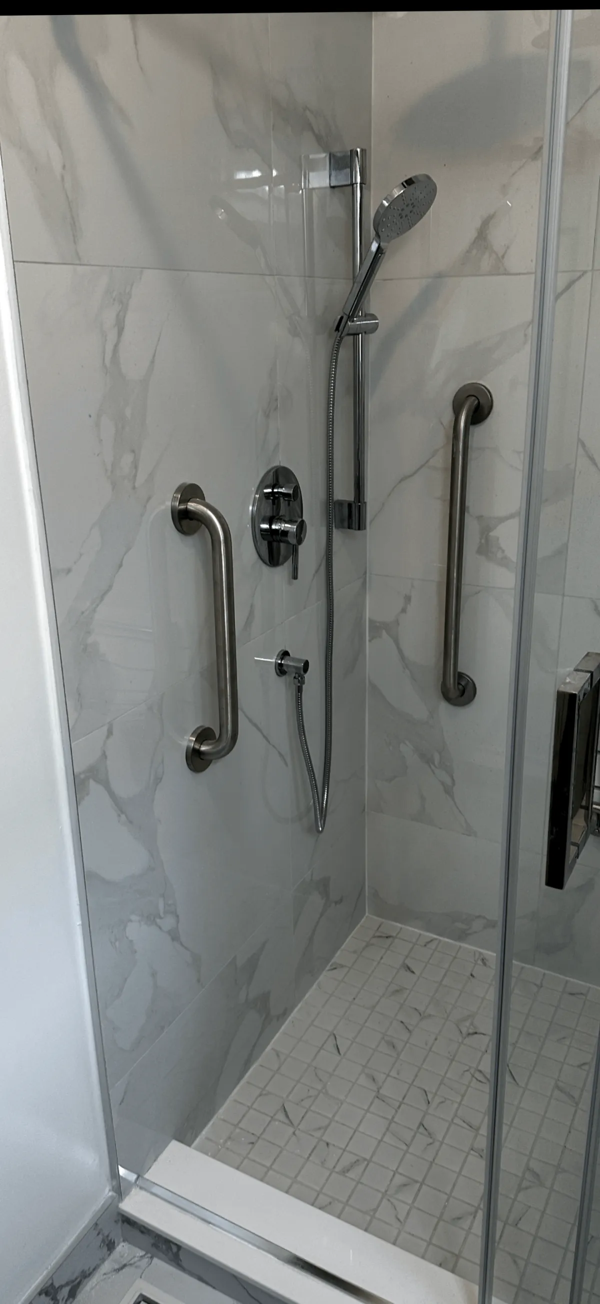 “Shower safety grab bars installed for senior accessibility.”