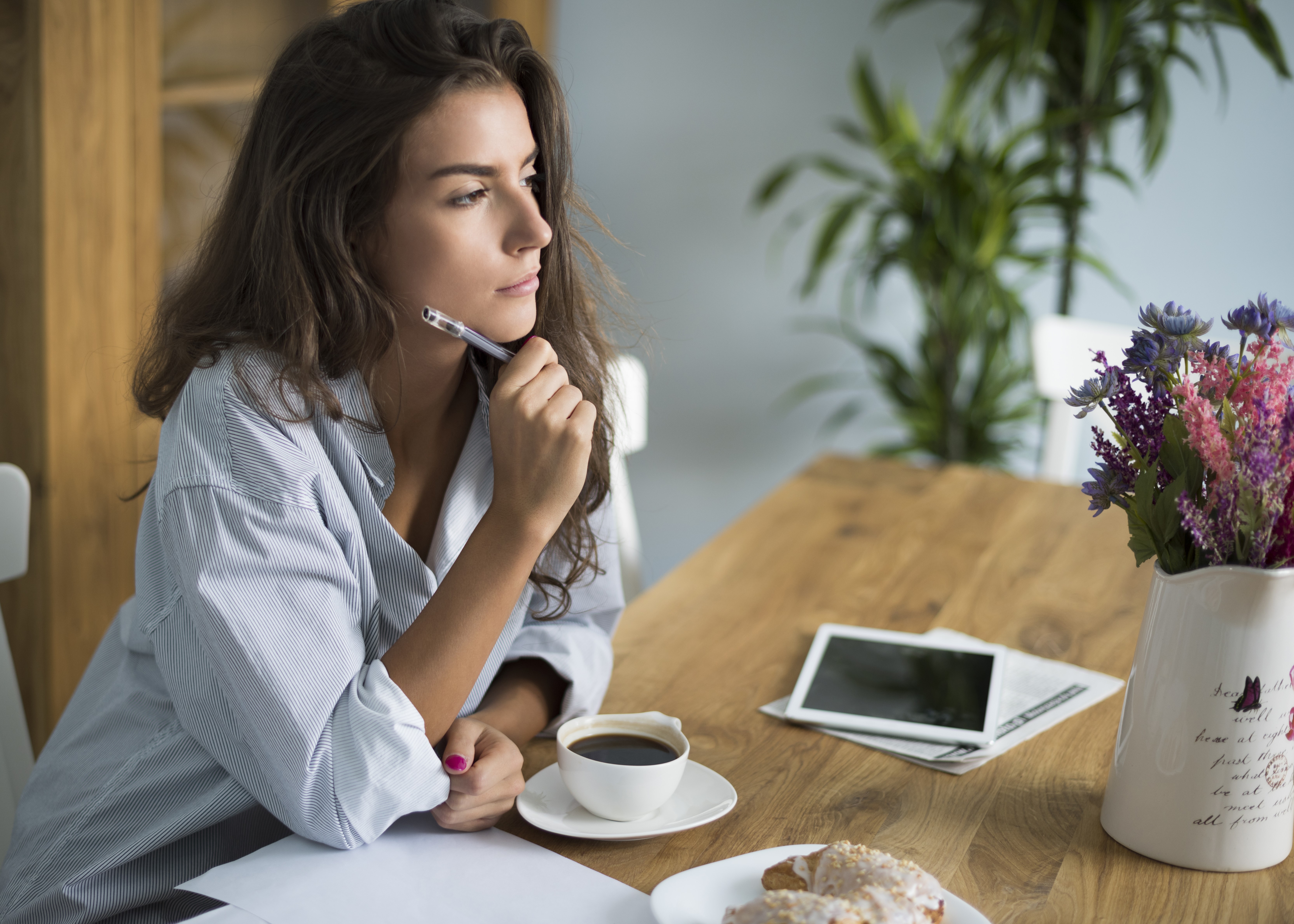 Woman resting peacefully while learning to release productivity guilt and create healthier emotional boundaries.