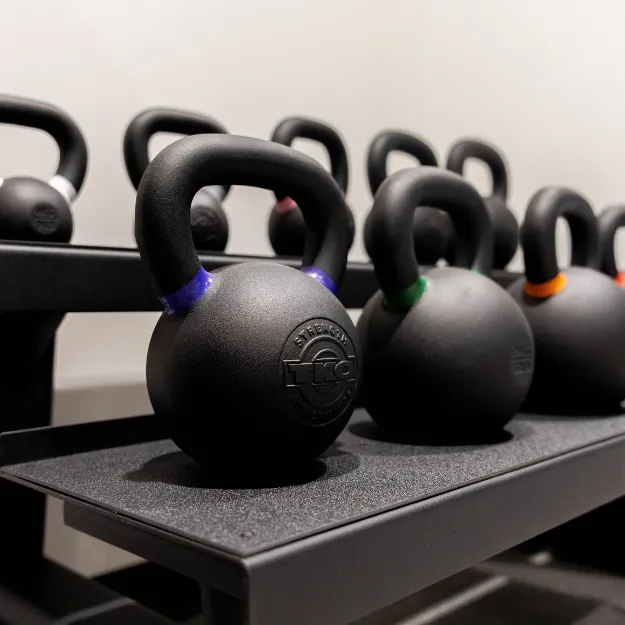 Kettlebells inside fitness center or gym