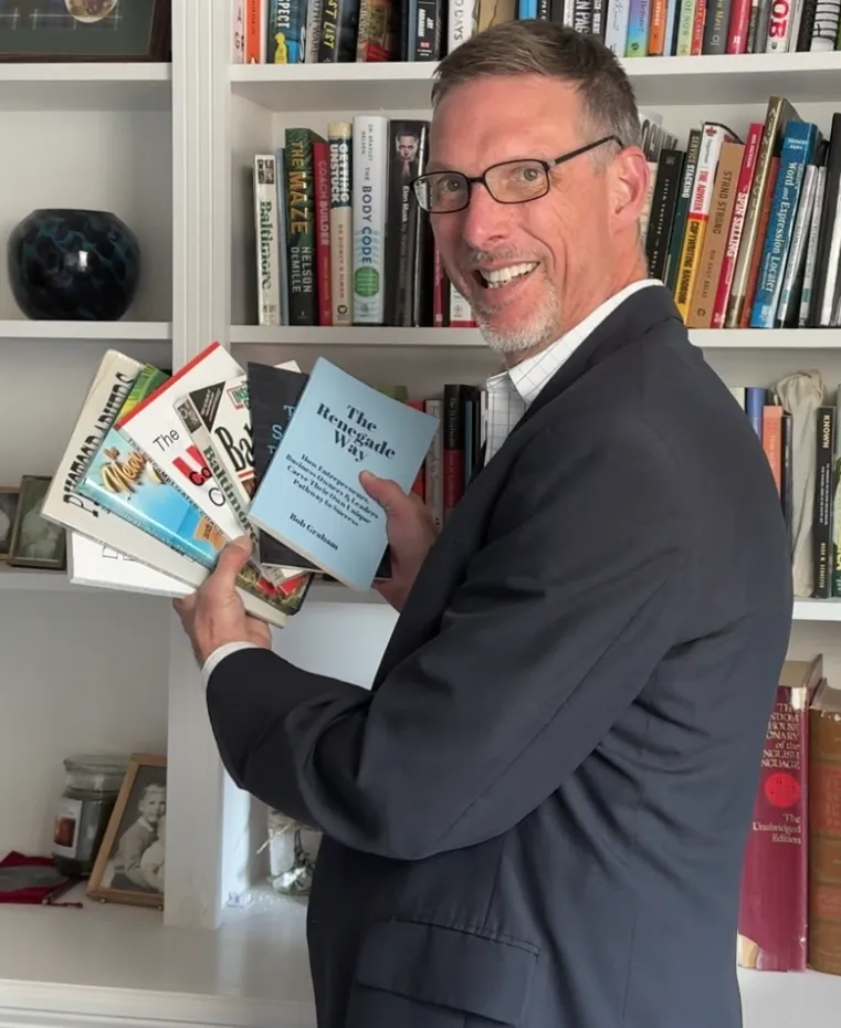 Bob Graham with some of the books he has written and helped others write.