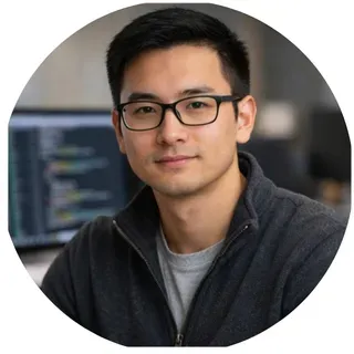 Portrait of Liam R., a focused man in his late 20s from Brisbane, working as a software engineer, wearing casual tech attire and appearing thoughtful