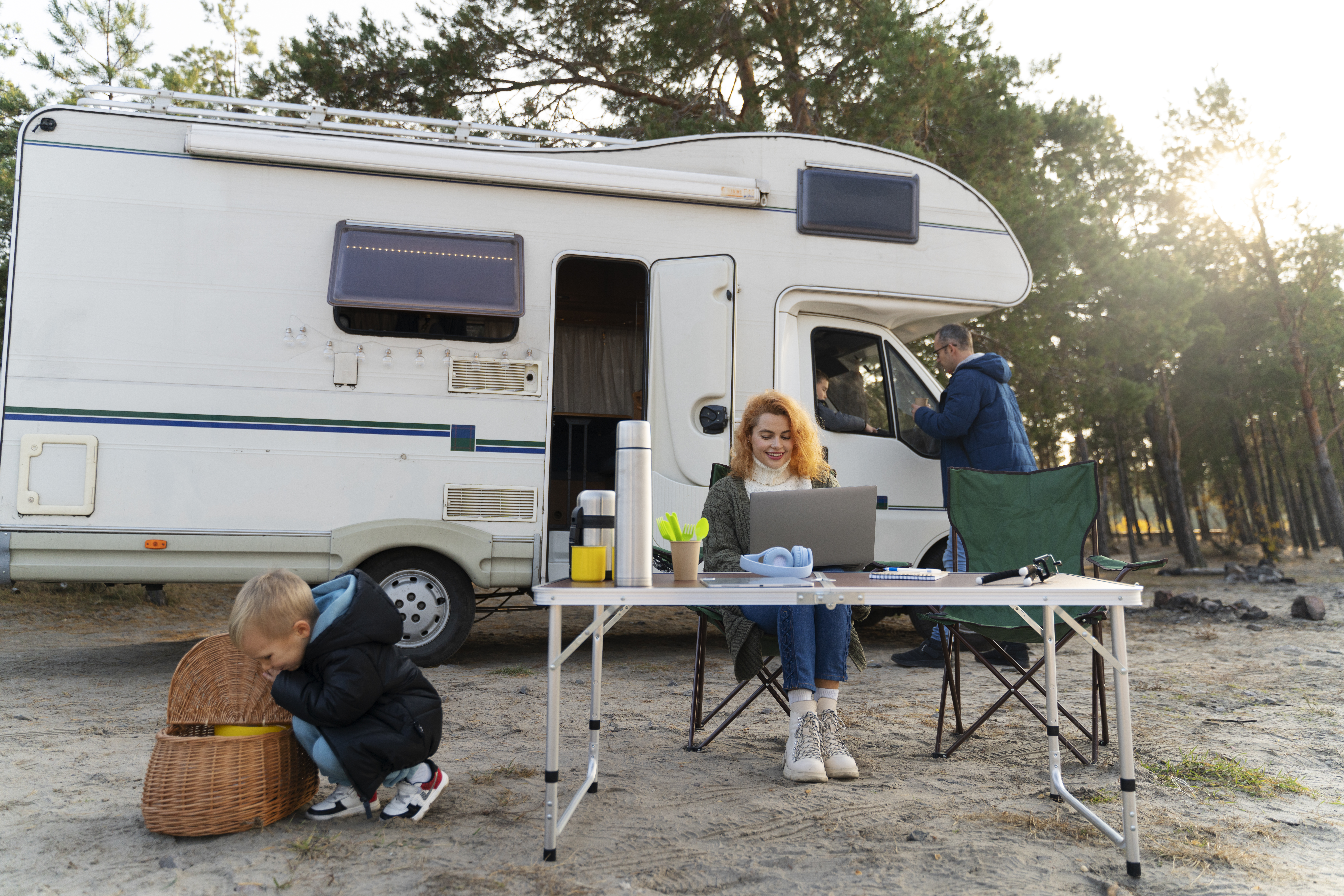 Family using RV at campsite representing recreational vehicle and boat loans