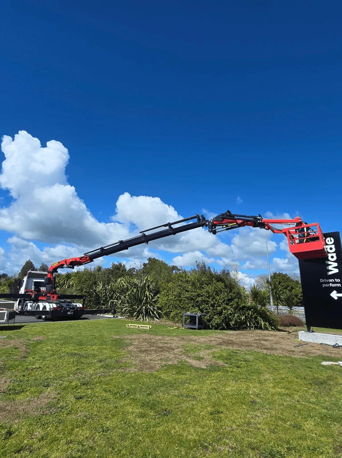 Commercial hiab crane lifting equipment on a Hamilton worksite