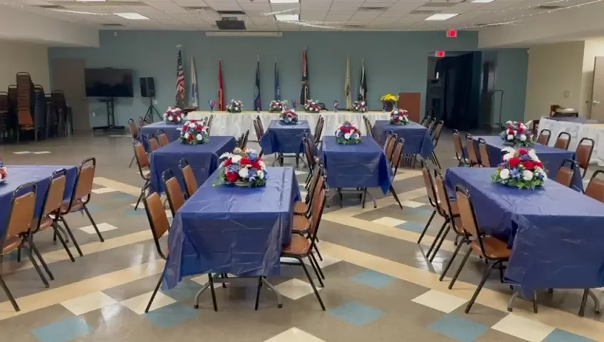 two person standing on gray tile paving