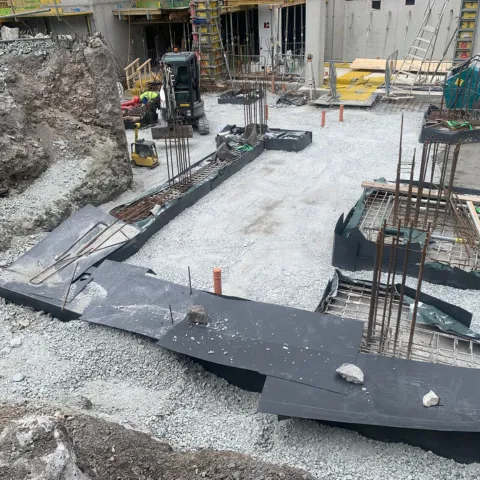 concrete foundations with rebar sticking up