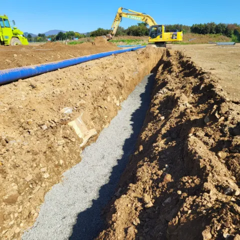 a picture of drainage covered by stones