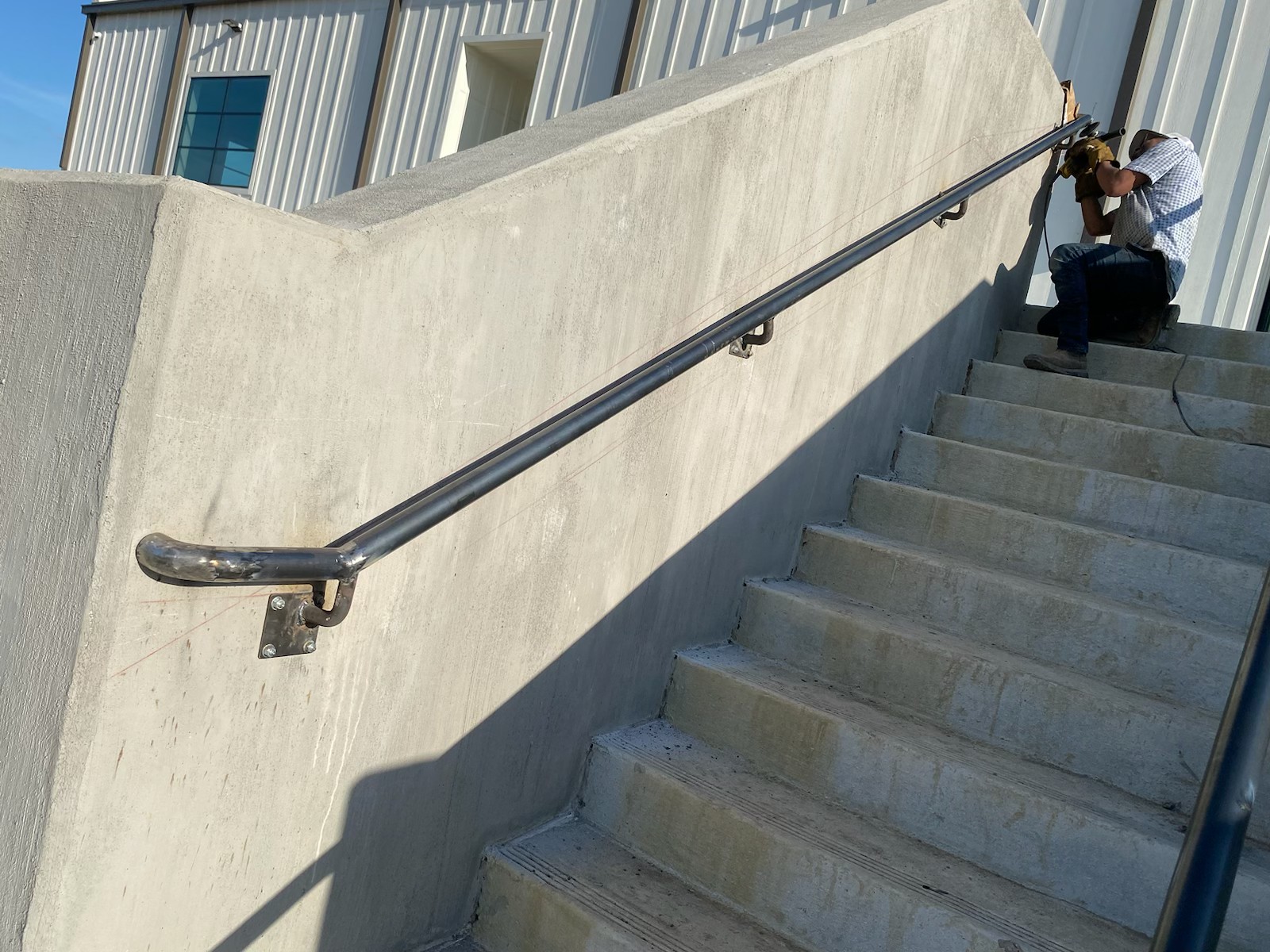 JG Welding fabricating a custom steel handrail