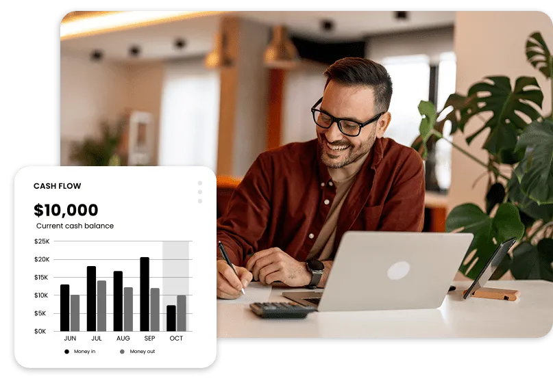Entrepreneur reviewing financial reports with AI-powered bookkeeping dashboard, representing tailored CFO, accounting, and tax solutions.
