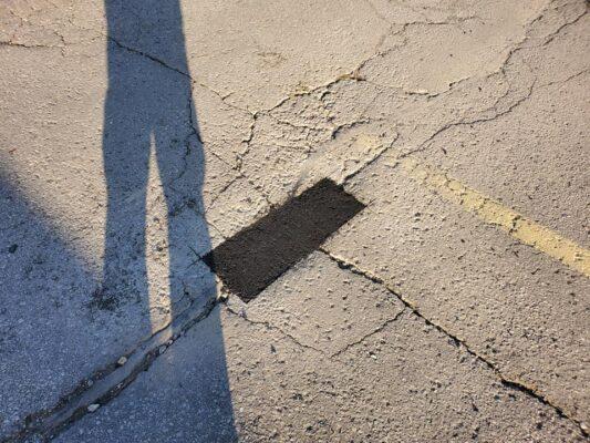 Pothole repair on Hamilton residential street