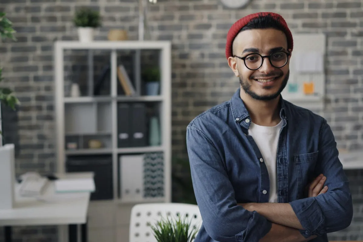 image of smiling man with arms crossed