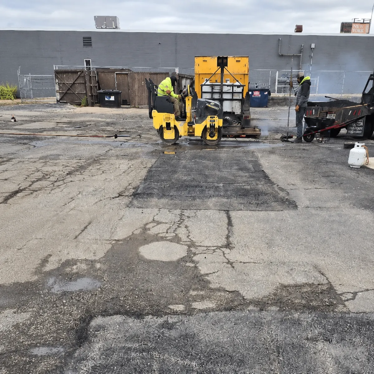 Commercial asphalt pavement being repaired with infrared patching equipment in Wisconsin